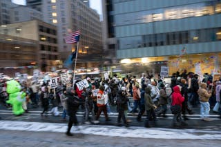 Protesters march Tuesday in a 'Stop ICE Terror' rally in downtown Minneapolis